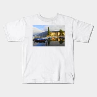 The little harbor in Iseo in the evening Kids T-Shirt